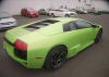 Right rear quarter panel of green metallic lamborghini murcielago with rear tail lights